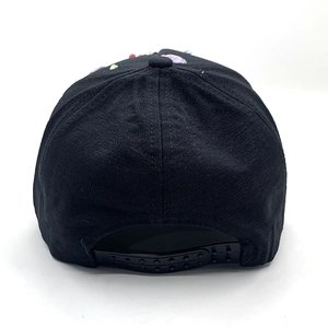 Detail view of adjustable plastic snapback closure on a black cotton butterfly baseball cap
