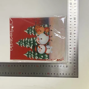 Christmas bottle cover dimensions shown with ruler measuring 14.5cm by 19.5cm size
