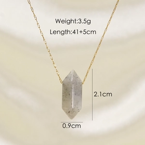 Macro view of a grey hexagonal natural stone pendant with dimensions and chain length