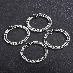 Detailed view of four silver stainless steel curb chain bracelets with spring clasps