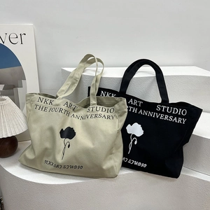 Minimalist large capacity canvas tote bags with floral print and shoulder straps