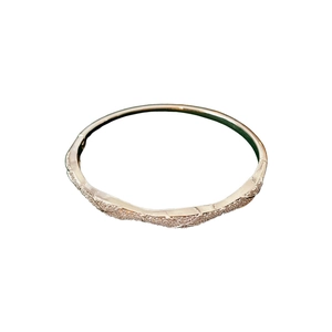 Elegant gold plated quilted bangle featuring sparkling cubic zirconia for women
