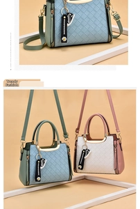 Detail of woven tote bags with diamond stitching, metal handles and daisy ribbon charms