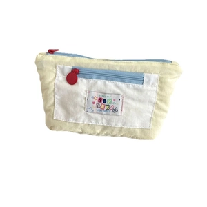 Large capacity canvas pencil case with multi-layer storage and blue zipper in pale yellow