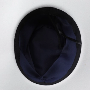 Detailed view of the internal lining and adjustable sweatband of the white fedora hat