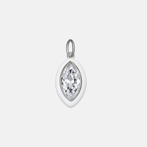 Macro shot of marquise-cut crystal pendant with white enamel border on silver loop