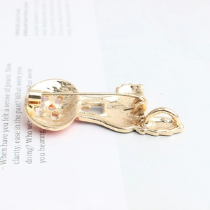 Creative pumpkin cat brooch in gold finish with secure pin backing and metal texture
