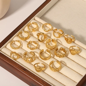 Bohemian gold plated 15-piece ring set featuring sun and floral embossed open rings