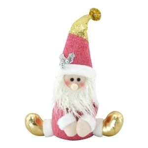 Pink Christmas gnome plush toy with gold sequined hat and white beard on white background
