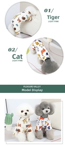 Detailed close-up of soft cotton pet t-shirts with tiger and cat prints for small dogs