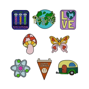 8-piece set of enamel pins featuring earth, science, nature and camping motifs on white background