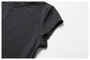 Close-up of charcoal grey athletic t-shirt neckline with premium stitching and matte finish