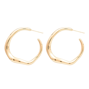 Minimalist irregular geometric gold wavy hoop earrings with a polished metallic finish