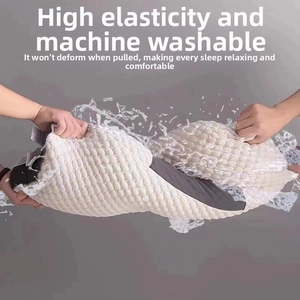 Detail showing the breathable 3D honeycomb mesh fabric and elastic structure of the pillow