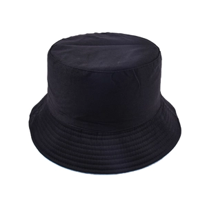 Reversible black cotton bucket hat with blue interior and durable stitched brim