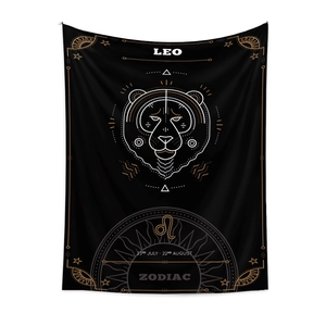 Detail of Leo Zodiac tapestry featuring gold lion artwork on black fabric background