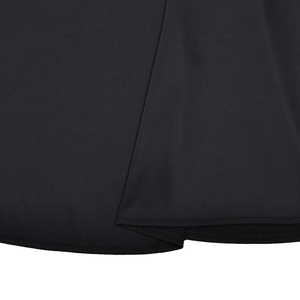 Close-up detail of the black sheer mesh fabric and hem stitching on the long dress