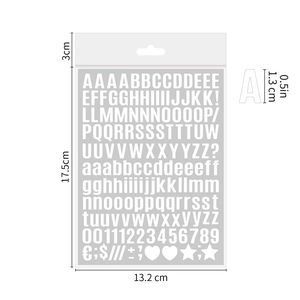 Detailed view of 0.5 inch white waterproof alphabet and number stickers with size markers