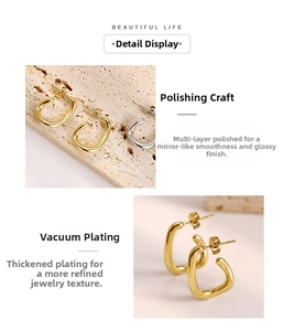 Detail of C-shaped metal earrings with high-gloss mirror finish and vacuum plating