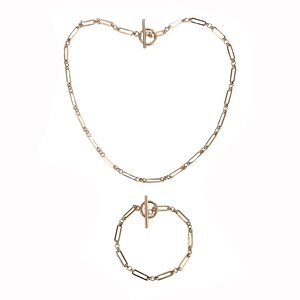 Detail of gold paperclip chain necklace and bracelet set with classic OT toggle clasp