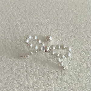 Elegant 925 sterling silver pearl bow stud earrings with screw back closure