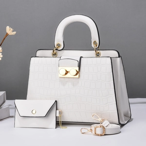 White faux crocodile skin tote bag and matching coin purse set with gold hardware