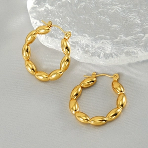 Polished gold stainless steel hoop earrings with unique oval bead textured design