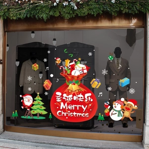 Détail de stickers de Noël pour fenêtre avec Père Noël, renne et lettrage