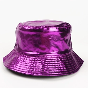 Close-up of shiny purple metallic bucket hat with reflective polished finish texture