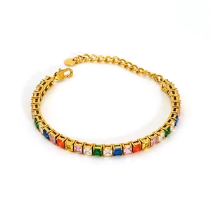 Close-up of golden stainless steel tennis bracelet with multicolor square zircons and lobster clasp