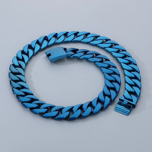 Detailed macro view of 24mm blue stainless steel cuban link chain with secure buckle