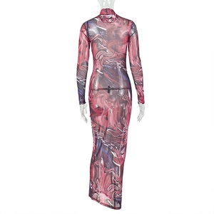 Detail of artistic abstract print on a slim-fit mesh long sleeve maxi dress