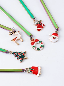 Close-up of rainbow stainless steel spoons with six colorful Christmas enamel pendants