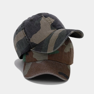 Detailed view of camouflage baseball caps featuring durable twill cotton and stitched eyelets