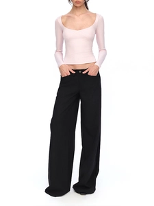 Pink slim fit U-neck long sleeve top styled with high waist black wide leg trousers
