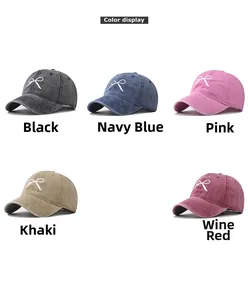Color display of washed cotton baseball caps with bow embroidery in five classic colors