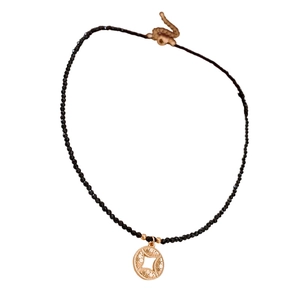Gold plated heart coin necklace with black crystal beads and hollow round pendant