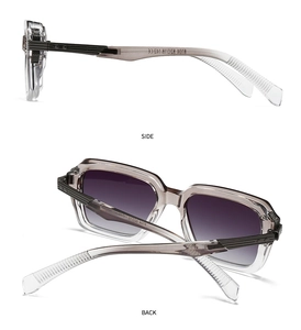 Detail view of square gradient sunglasses with textured metal temple and size markings