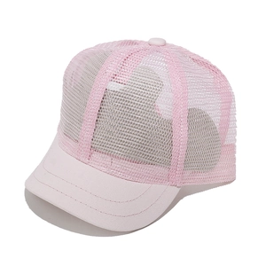 Close-up of pink breathable mesh baseball cap with durable short brim for summer