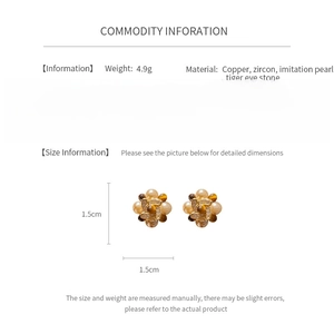 Product size and material details for tiger eye flower earrings showing 1.5cm dimension