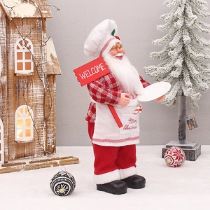 Chef Santa figurine in red checkered outfit with Welcome sign for Christmas decor