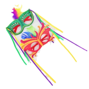 Carnival masks set with feathers and glitter details on white fur background