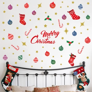 Vibrant Merry Christmas wall stickers set featuring bells and socks on a bedroom wall