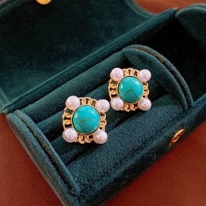 Vintage gold square stud earrings with turquoise stone and pearls in a velvet jewelry box
