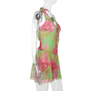 Detailed side view of floral print mesh beach dress with V-neck and tie waist