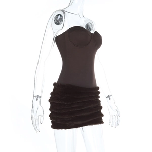 Detail view of bodycon tube dress with brown faux fur hem on transparent mannequin
