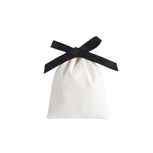 Elegant white fabric jewelry pouch with a black ribbon bow tie for gift packaging
