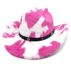 Detail of pink cow print plush cowboy hat with black band and vintage floral studs