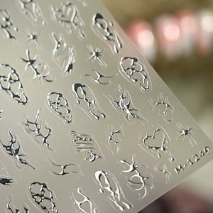 Y2K silver liquid metal nail stickers with star and fluid line patterns M-1249