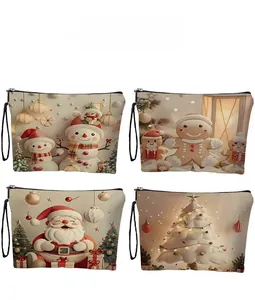 Detail of four festive holiday cosmetic bags with snowman and Santa illustrations